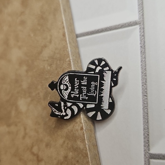 None Accessories - Black and White 'Never Trust The Living' Snake Pin